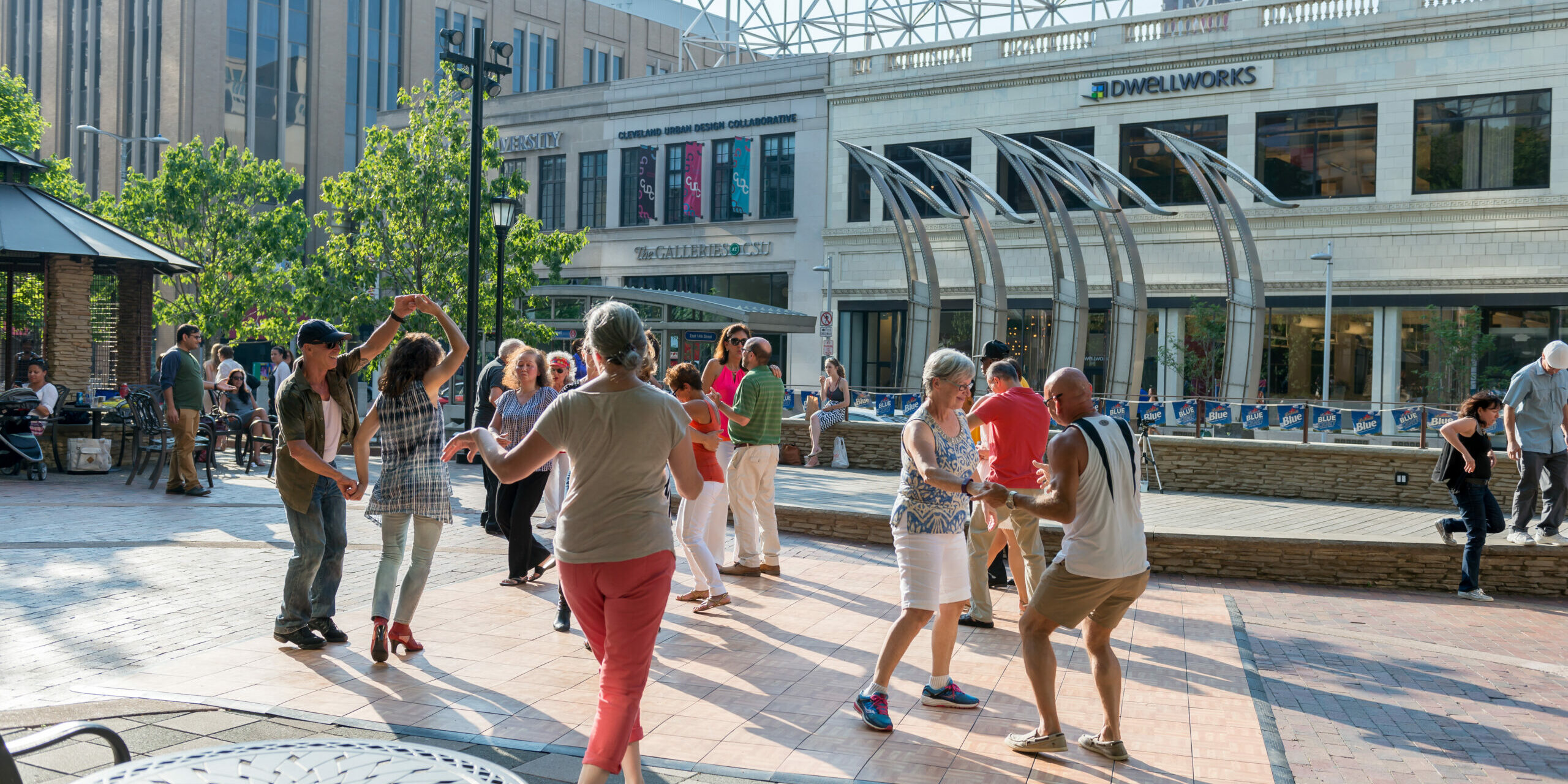 People dancing at Playhouse Square Plaza, which is along GCRTA Healthline BRT